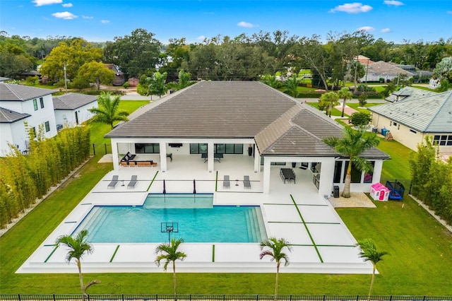 view of swimming pool featuring a yard, a patio area, and outdoor lounge area