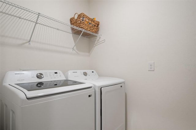 laundry area with laundry area and washing machine and dryer