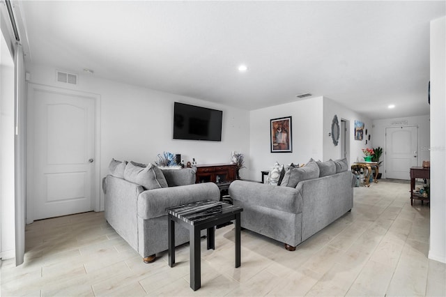 living room featuring light wood-type flooring