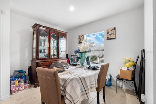 dining room featuring light wood-type flooring