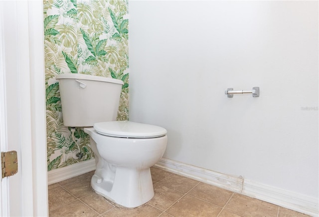 bathroom featuring tile patterned flooring and toilet