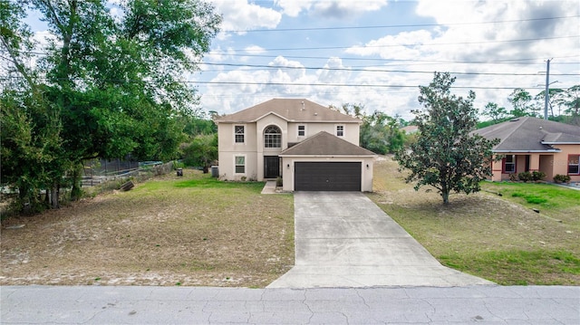 view of front of house featuring a garage and a front yard