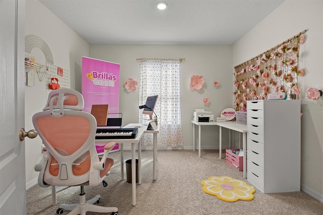 bedroom featuring carpet flooring and a textured ceiling