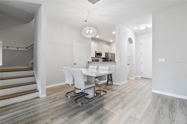 dining room featuring light hardwood / wood-style flooring