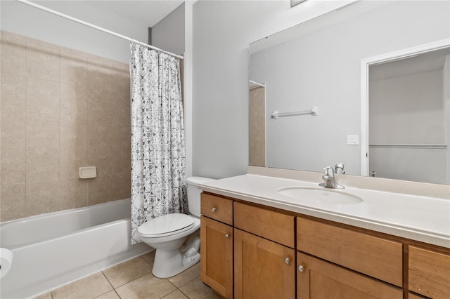 full bathroom featuring vanity, toilet, tile patterned flooring, and shower / bath combo