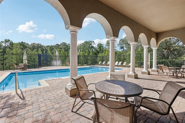 view of swimming pool featuring a patio