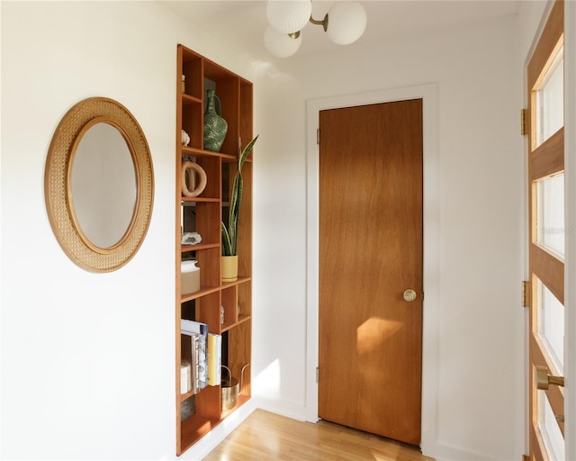 hallway featuring light hardwood / wood-style floors