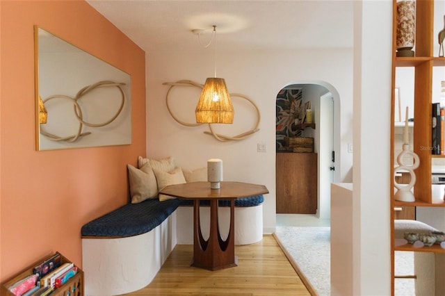 hallway with light hardwood / wood-style flooring