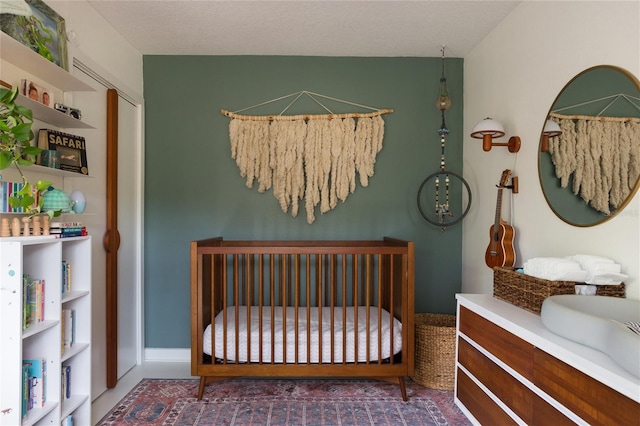 bedroom with a nursery area