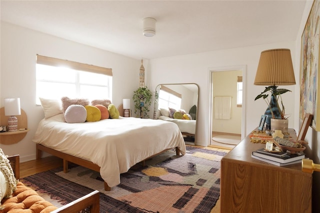 bedroom featuring hardwood / wood-style floors