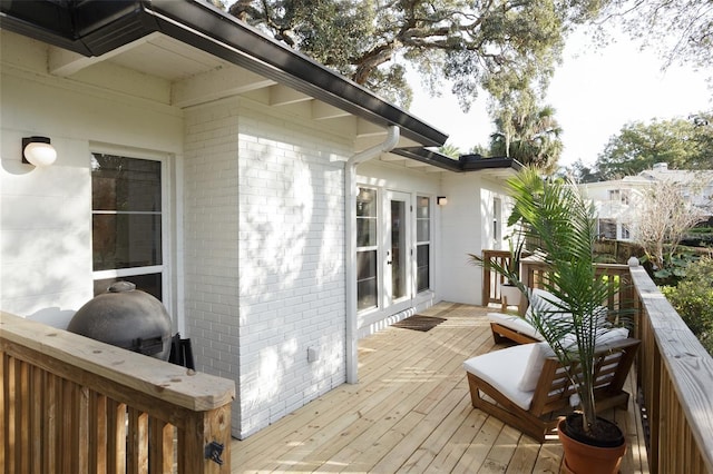 wooden terrace featuring french doors