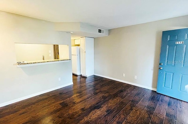 interior space featuring dark hardwood / wood-style flooring