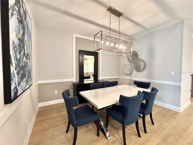 dining room with light hardwood / wood-style flooring