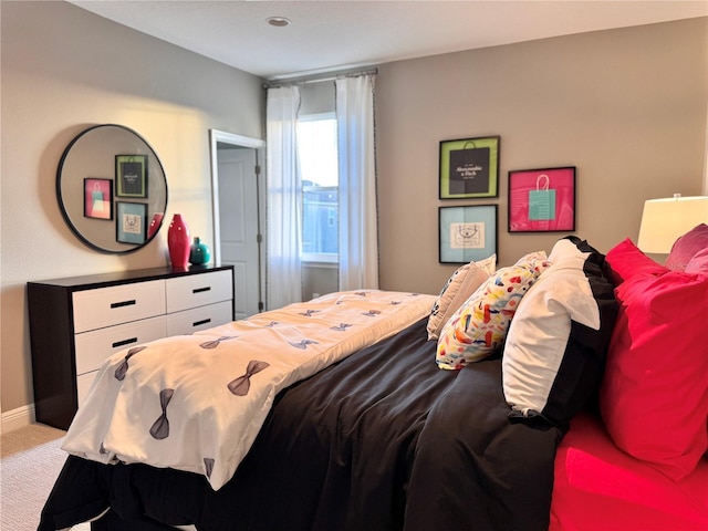 bedroom featuring carpet