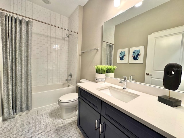 full bathroom featuring vanity, shower / tub combo, tile patterned floors, and toilet