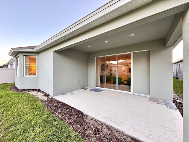 back of property with a patio area