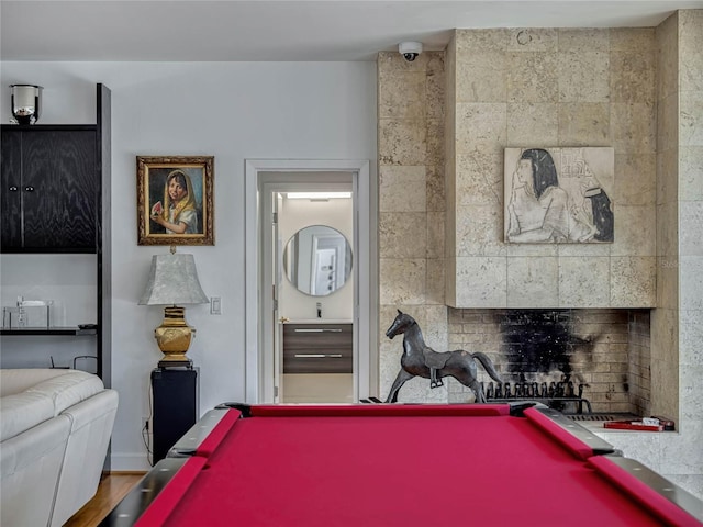 recreation room featuring pool table and wood finished floors