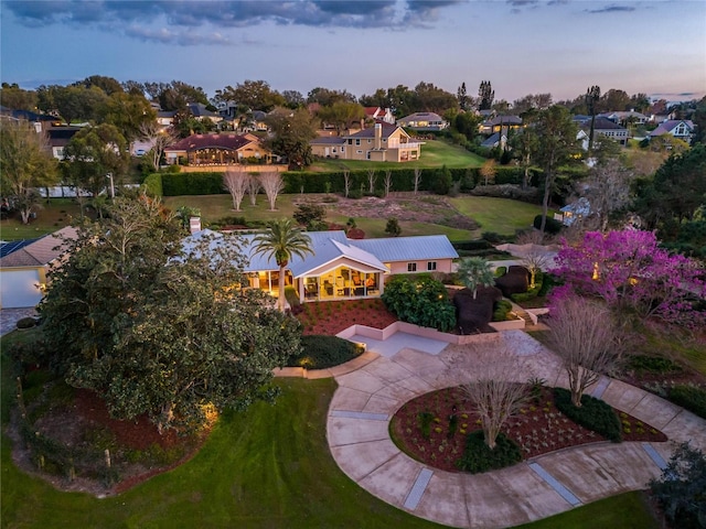 aerial view at dusk with a residential view