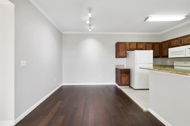 kitchen featuring crown molding, white appliances, light hardwood / wood-style flooring, and rail lighting