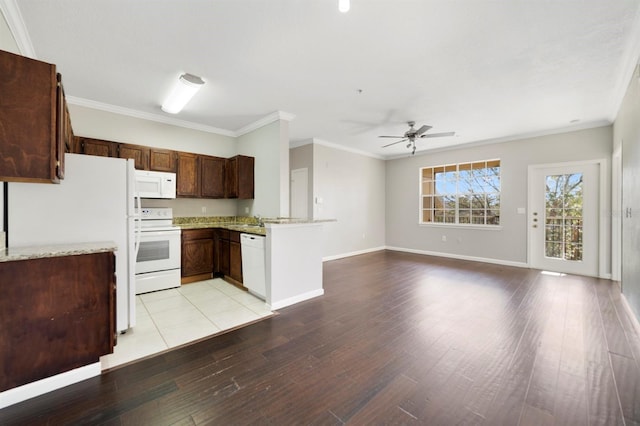 kitchen with crown molding, light wood-type flooring, ceiling fan, and white appliances