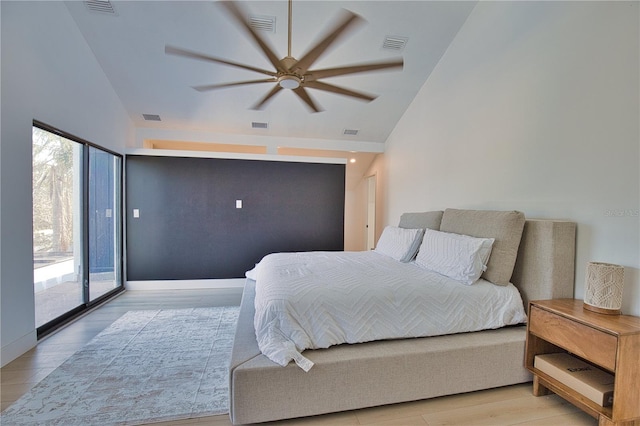 bedroom featuring ceiling fan, high vaulted ceiling, access to outside, and light hardwood / wood-style floors