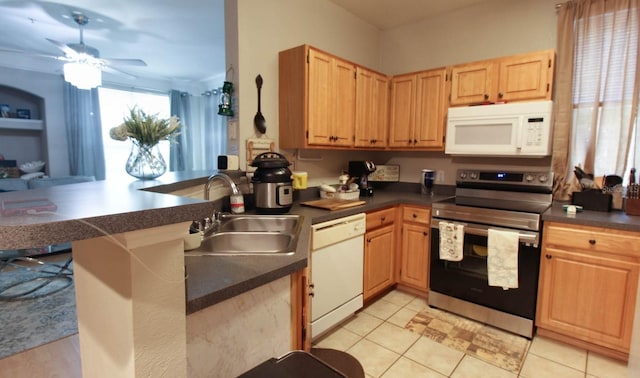 kitchen featuring sink, light tile patterned floors, ceiling fan, kitchen peninsula, and white appliances