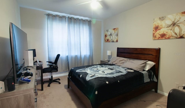 bedroom with ceiling fan and light colored carpet