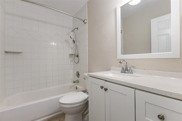 full bath featuring toilet, shower / bathtub combination, and vanity