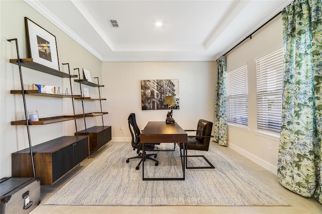 home office with a raised ceiling