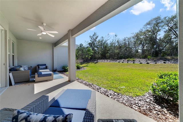 view of patio with ceiling fan and an outdoor hangout area