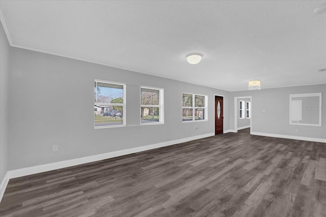 unfurnished living room with dark wood-type flooring