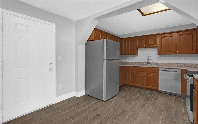 kitchen featuring appliances with stainless steel finishes and sink