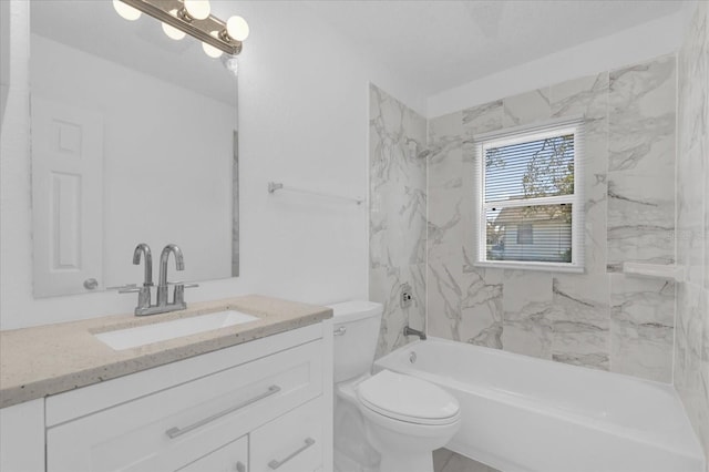 full bathroom featuring vanity, tiled shower / bath combo, and toilet