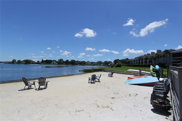 view of home's community with a water view