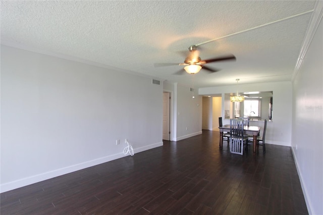 unfurnished room with crown molding, dark wood-type flooring, ceiling fan with notable chandelier, and a textured ceiling