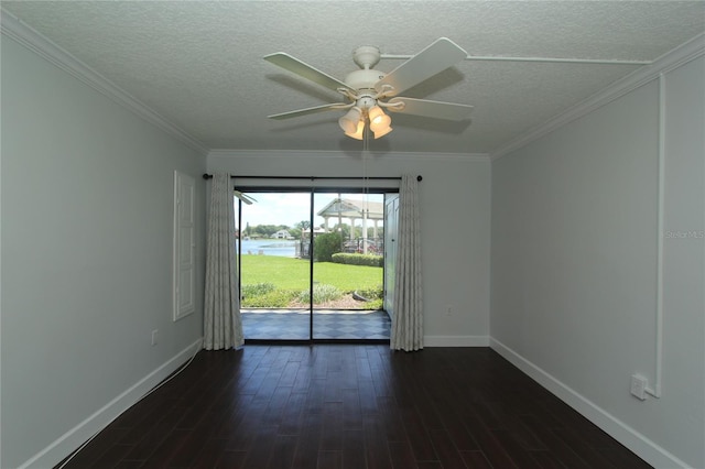 unfurnished room with a textured ceiling, ornamental molding, dark hardwood / wood-style floors, and ceiling fan