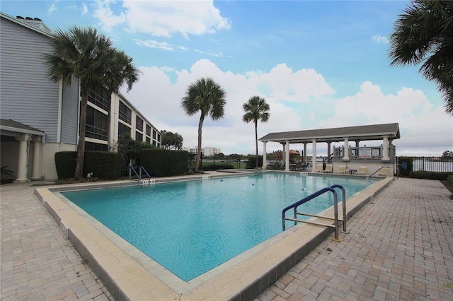 view of swimming pool featuring a patio