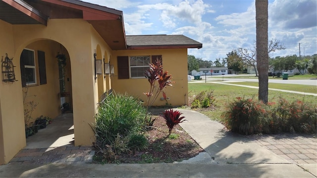 view of home's exterior featuring a lawn