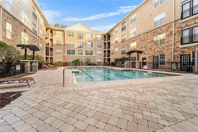 view of pool with a patio area