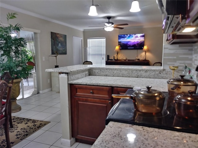 kitchen with black range with electric stovetop, light stone countertops, ornamental molding, light tile patterned floors, and a ceiling fan