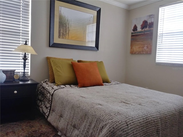 bedroom with crown molding