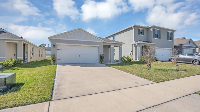 view of front of property featuring a garage and a front lawn