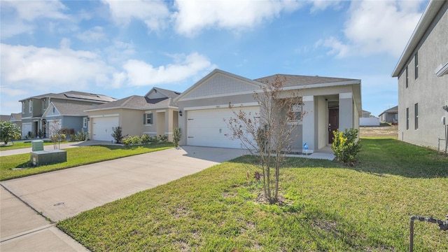 ranch-style home with a garage and a front yard