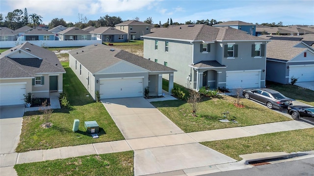 view of front of house with a garage and a front lawn