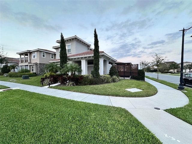 view of home's exterior featuring a yard