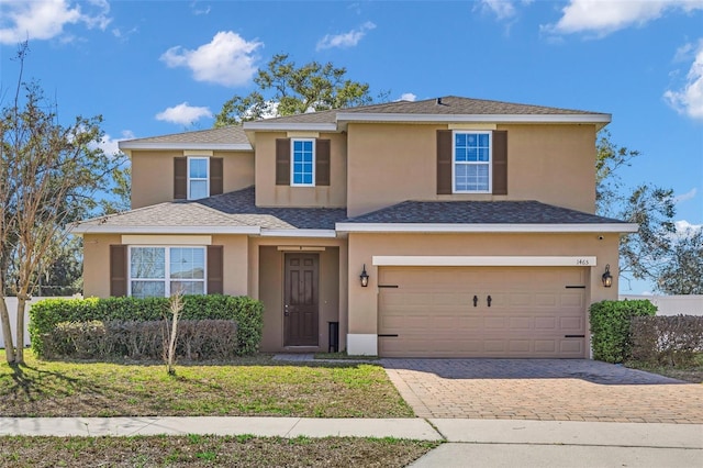 view of front of property with a garage