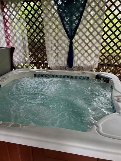 exterior details with a jacuzzi