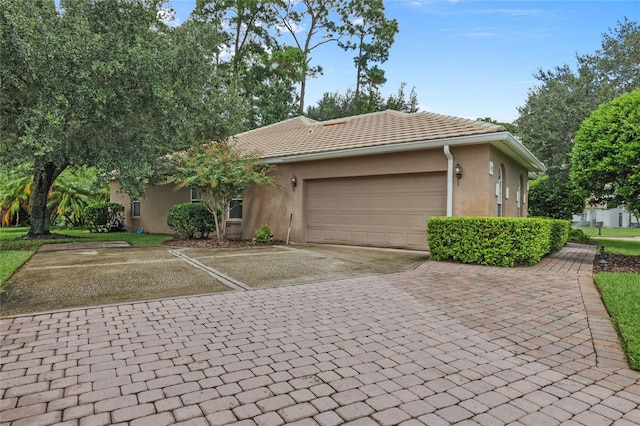 view of front of home with a garage