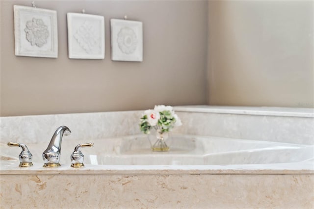 bathroom featuring a washtub