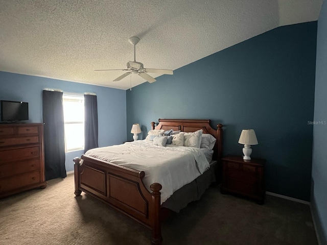 carpeted bedroom featuring lofted ceiling, a textured ceiling, and ceiling fan